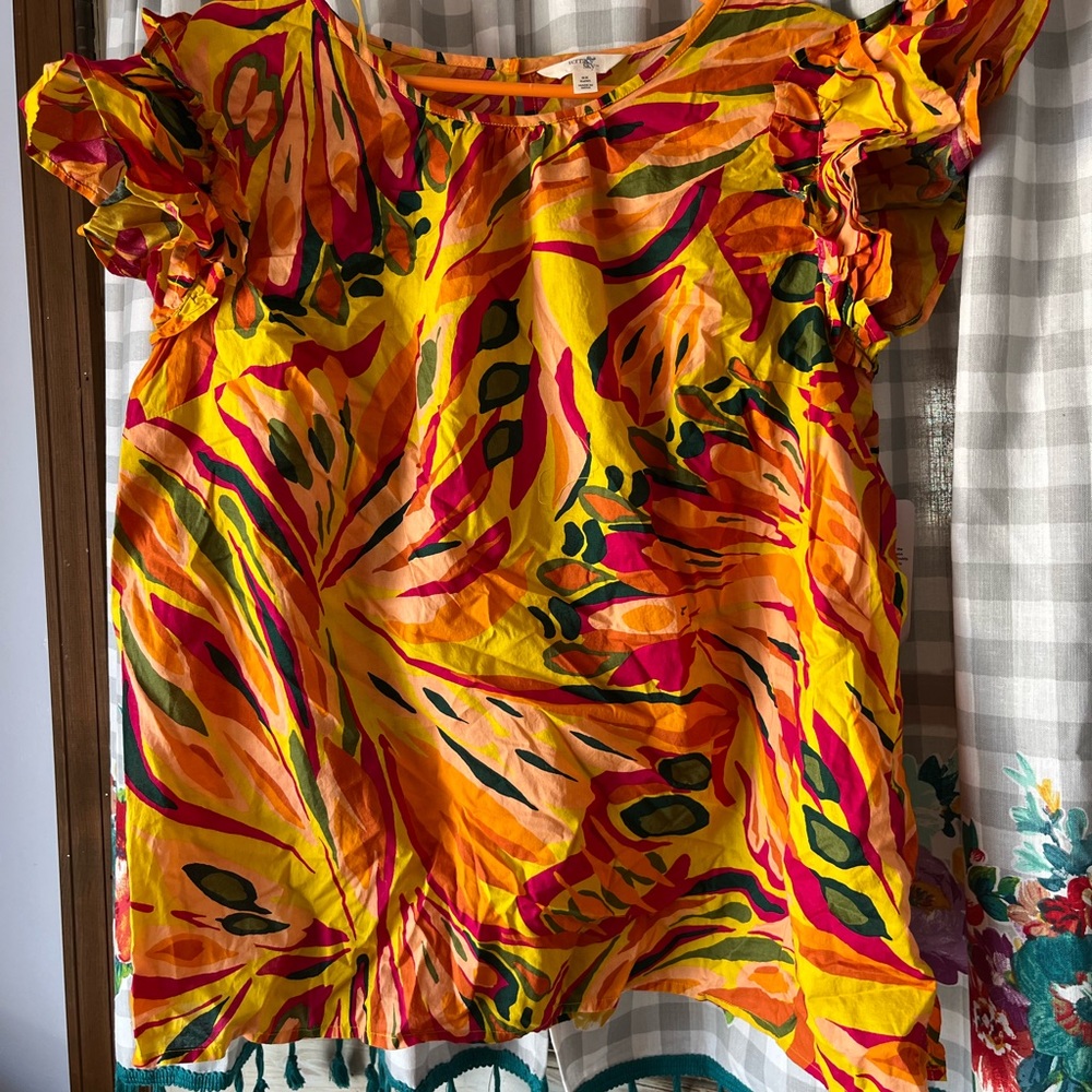 3/$25- NWT! Very bright flowy top! Never been worn.